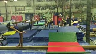 Back handspring layout step out on beam