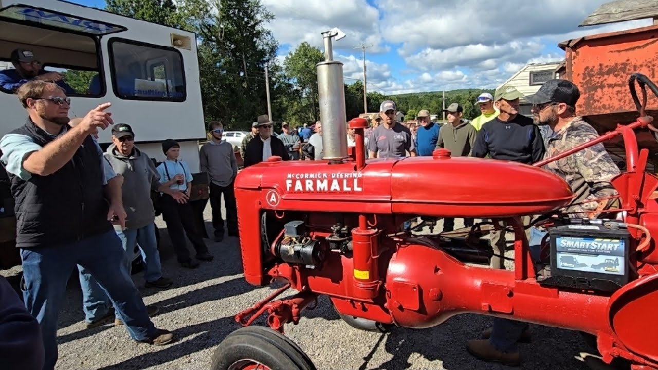 Red, Blue, and Green Tractors Sell at Auction