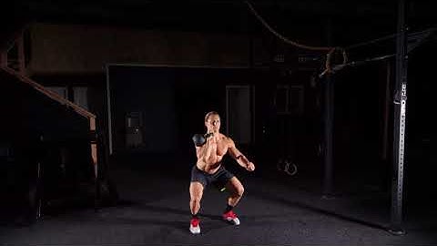 Single Arm Kettlebell Thruster