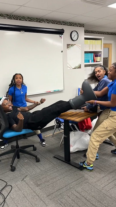 Kids help teacher stuck in big boots #shorts