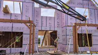 Raising Big Curved Timber Trusses! Up, down and then back up into place!
