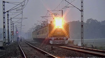 Head light on || Katwa - Bandel Local Train train passing a busy Rail Gate