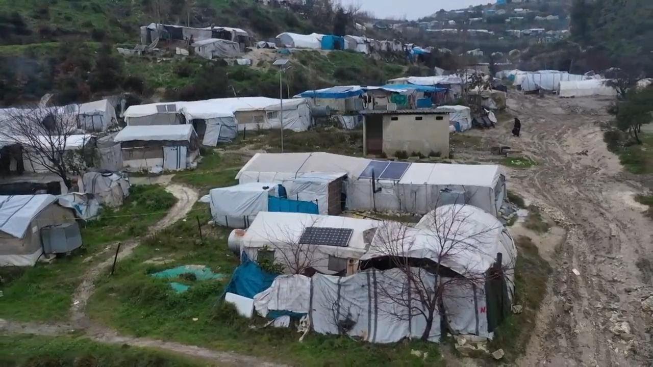 Rain and cold bring misery to displaced Syrians living in tent camps