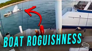 Person in a Boat Cuts off Another Then Sprays Water on the Smaller