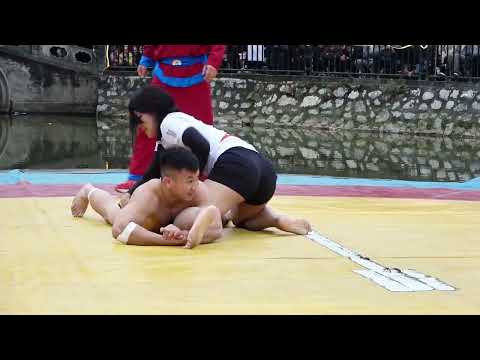 Vietnamese men and women wrestling festival (hội làng vật nam nữ Việt