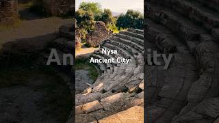 Zeytin Dalları Arasında Ve Köklerinde Bir Antik Kent Resimi