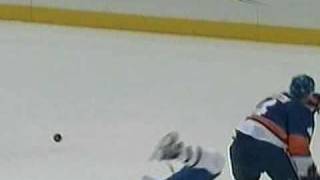 Mark Eaton hipchecks Scott Gomez
