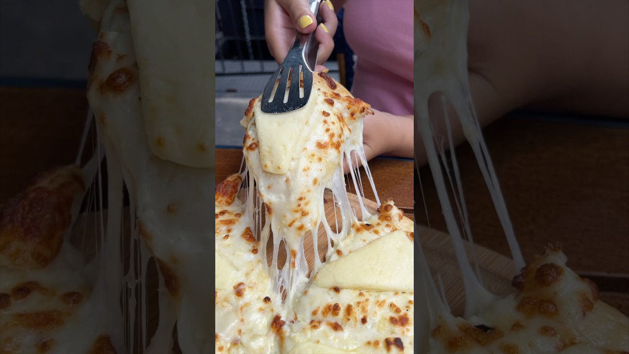 A healthy amount of cheese in this KHACHAPURI from Saperavi NYC! 🧀🔥🤤 #DEVOURPOWER