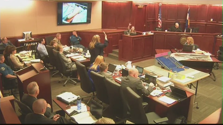 Heather Snyder shows the jury her injuries