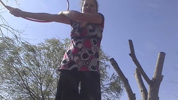 Circular crossed arm fold hoop trick