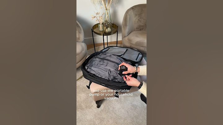 Watch this backpack shrink your clothes!  #travelpack #shorts