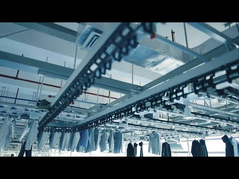 GLOBALink | Smart tech at E China clothing factory improves efficiency, working