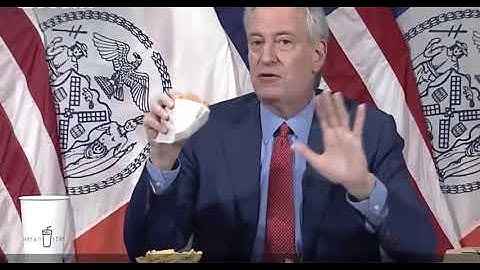 New York City Mayor Bill de Blasio Eats Burger in Bizarre Vaccination Promotion: "Mmm, Vaccinations"