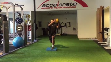 Split Stance MedBall Diagonal Chop Lift on Airex Pad - Contralateral