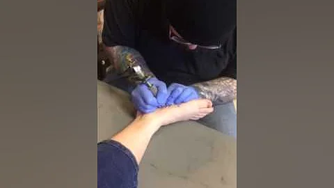Kendra Bordenkircher getting tattoo