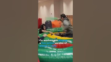Co-workers let loose with whack-a-mole team building #Shorts