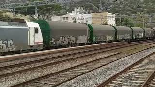 Bobinero Castellbisbal-Sagunto remolcado por la 253079 y Rodalies S465-463