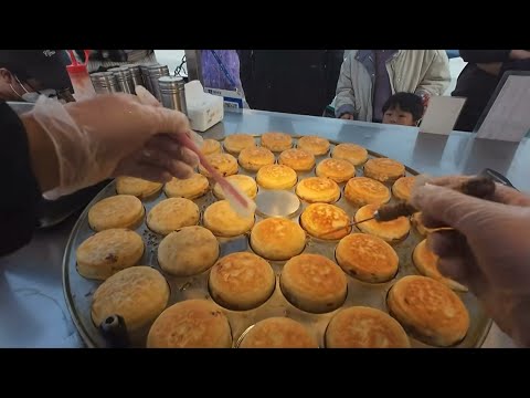 Frying hamburgers, street food.