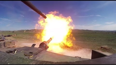 HD POV Footage Of M1A1 Abrams Tanks Firing