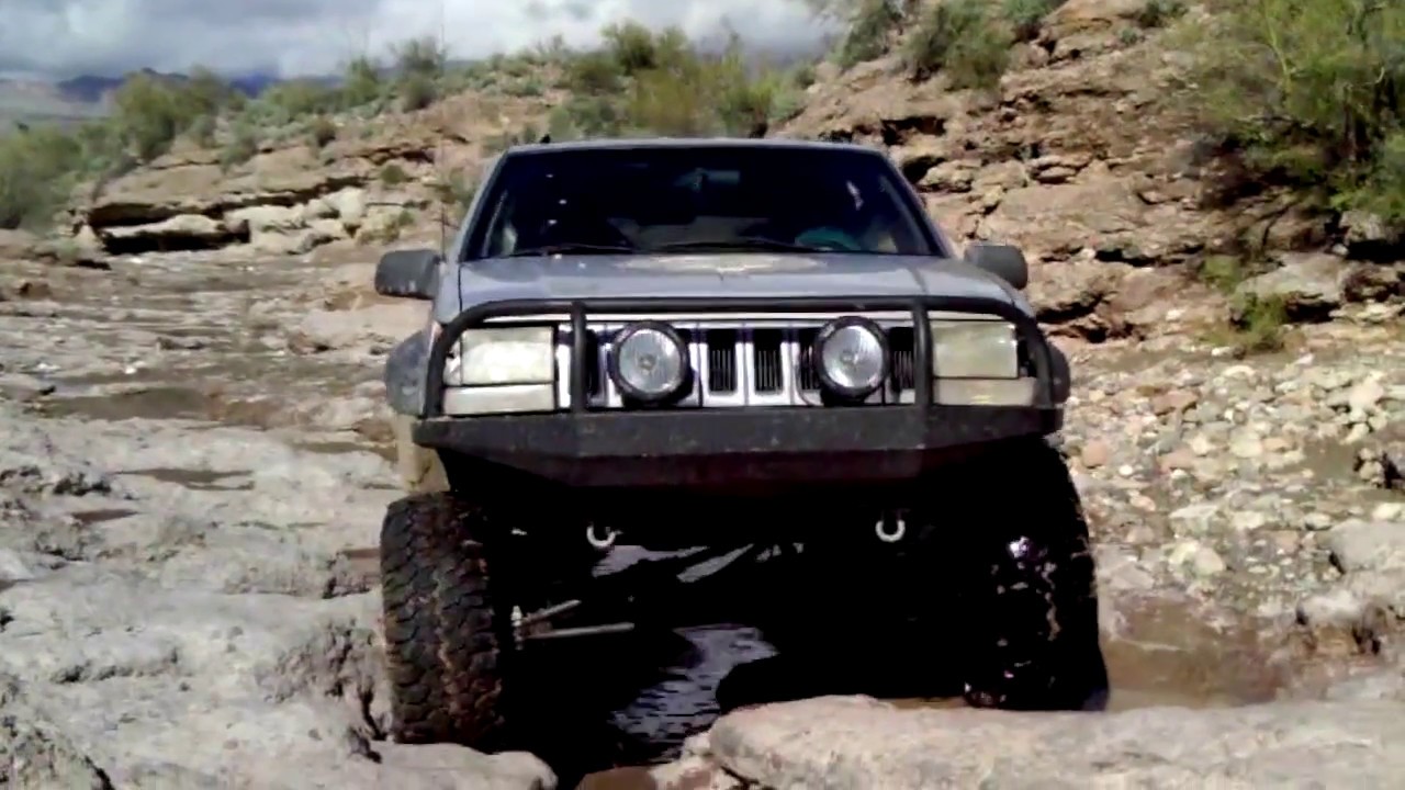 Jeep Grand Cherokee makes an AWESOME trail rig!  Here's ours...on Raw Deal in Arizona