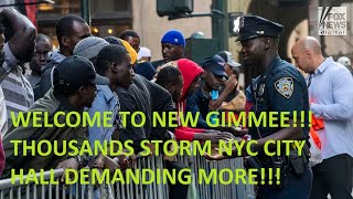 NOT NEW GUINEA BUT NEW GIVE ME!!! THOUSANDS STORM NYC CITY HALL.