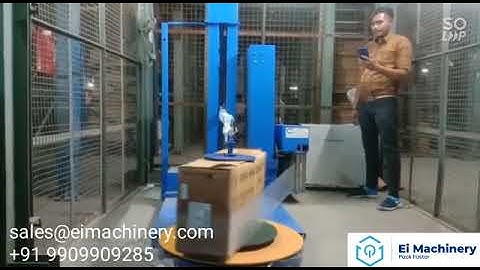 Box wrapping machine motorized holding system with pre stretch unit and roll up down system
