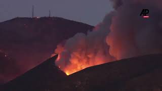 Fire crews continue to battle huge wildfire in San Diego