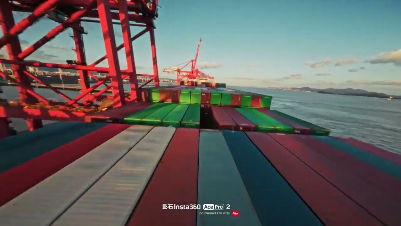 Ningbo port, tons of giant ships shuttle, steel and waves intertwined  As the world's largest port i