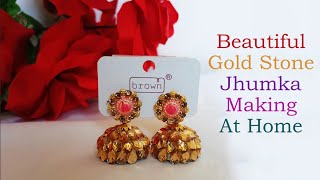 Reflective Radiance : Crafting Gold Stone Jhumkas at Home