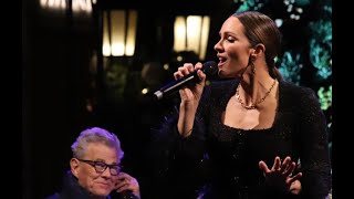 Kat McPhee performs &#39;Jingle Bell Rock&#39; on Rodeo Drive LA