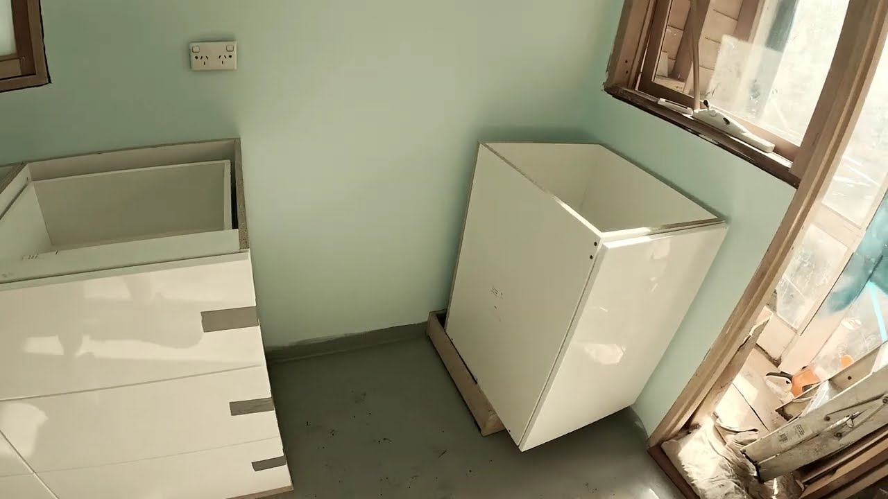 Freddo Reno Laundry update Cabinets go in