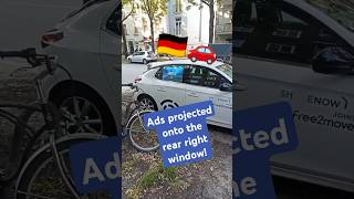 Rental Cars In Germany Ad Clips Projected Onto The Rear Right Side Window