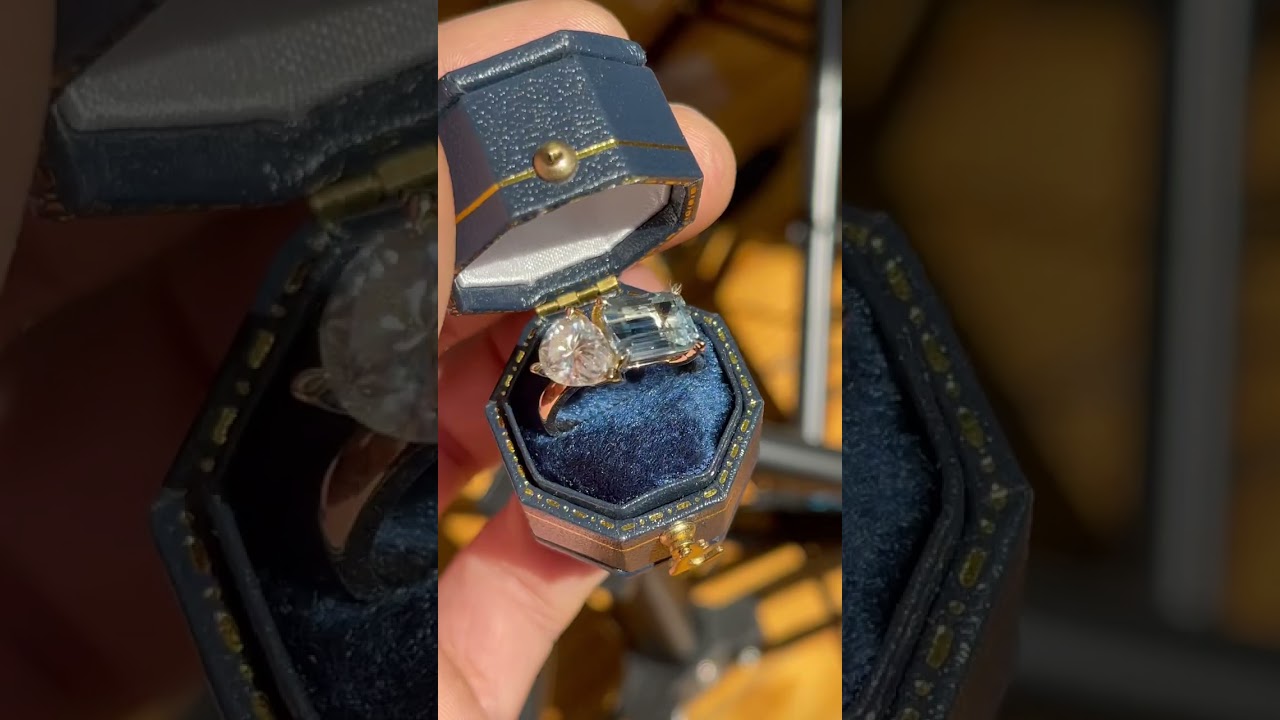 Emerald Cut Aquamarine with Pear Cut Paired Moissanite Two-Stone Engagement Ring.