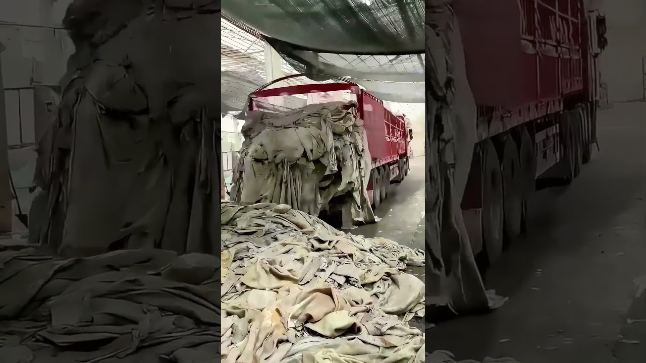 Truck Unloading: Tons of Fabric Spilling Out in an Industrial Scene!