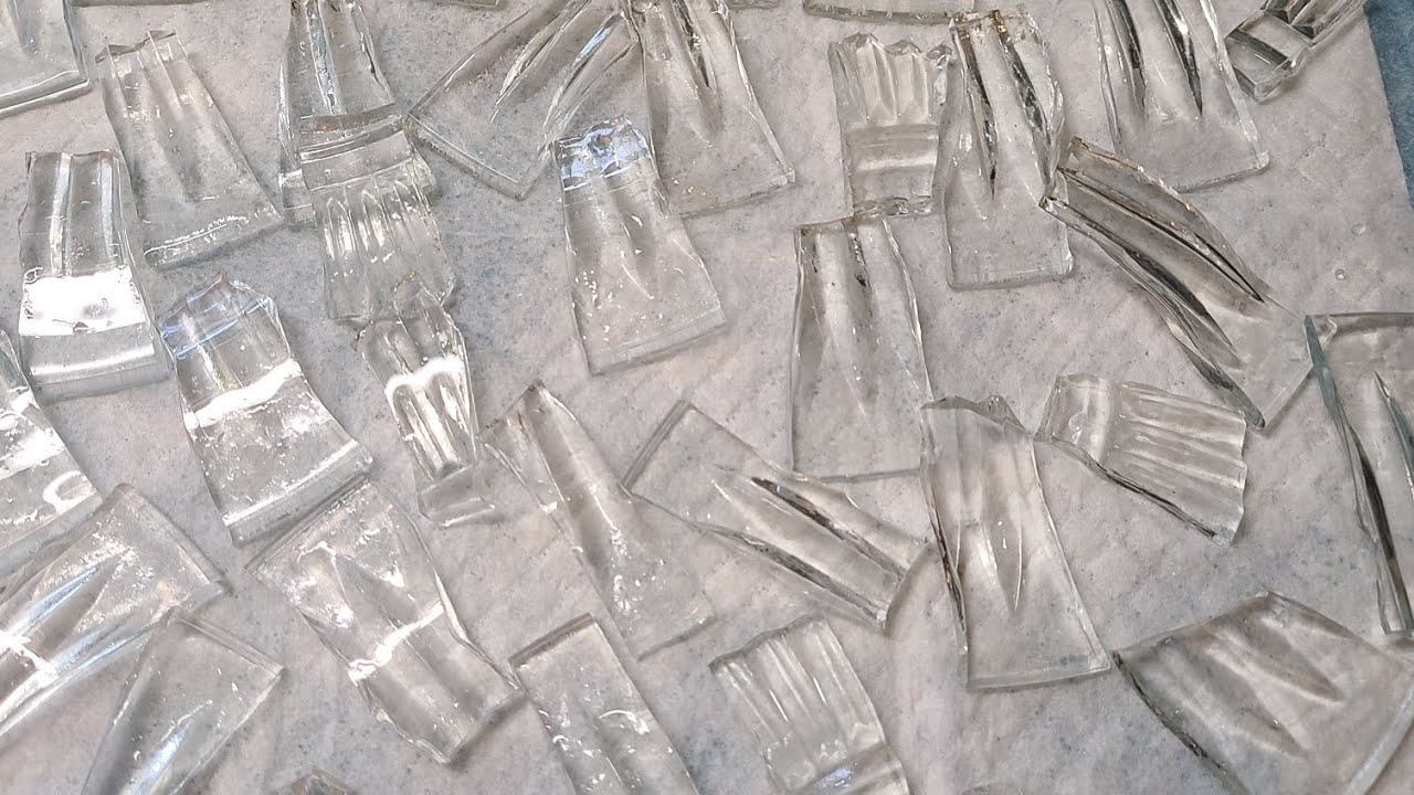 Breaking an old glass plate using a heat gun and cold water.