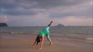 Spontaneous Yoga on the Thai beach by Viki