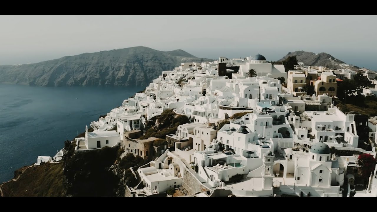 Valentinos & Nikki stunning wedding in Santorini. The wedding location of your dreams!