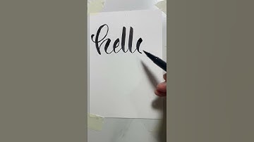 How to write hello in calligraphy using brush pen #calligraphyart , #brushlettering , #shorts