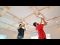 Carpenters Install Coffered Ceiling