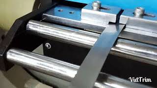 Mechanical roll feeder