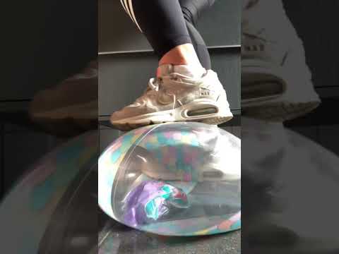 Beach ball trampled and stomped to pop by Nike Command