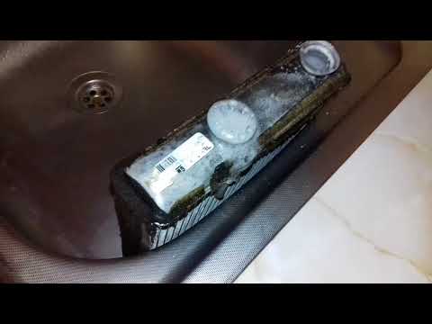 Video: Ce fluid puneți într-un radiator auto?