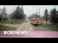 Dramatic footage shows truck narrowly miss school bus as brakes fail