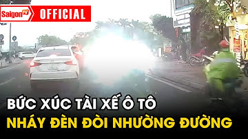 Bức xúc tài xế ô tô đi ngược chiều, liên tục nháy đèn đòi nhường đường | Tin tức SaigonTV