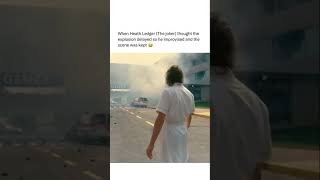 When Heath Ledger (The joker) thought the explosion delayed so he improvised and the scene was kept