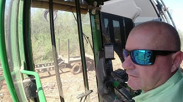 Loading a few Peterbilt log trucks