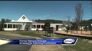 Former principal charged with soliciting prostitution
