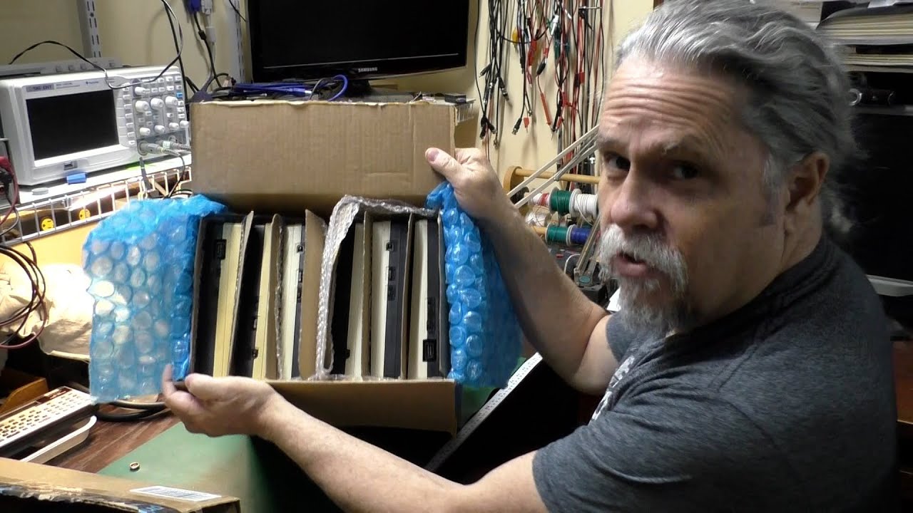 TRS-80 Model 100 6-pack. Six M100s in need of some TLC.