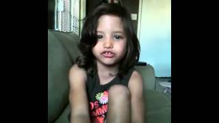 Little girl sings for her dad.