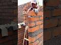 Expert Bricklaying: How to Build a Perfect Brick Wall! 🧱✨ #shorts #construction #masonry #trending